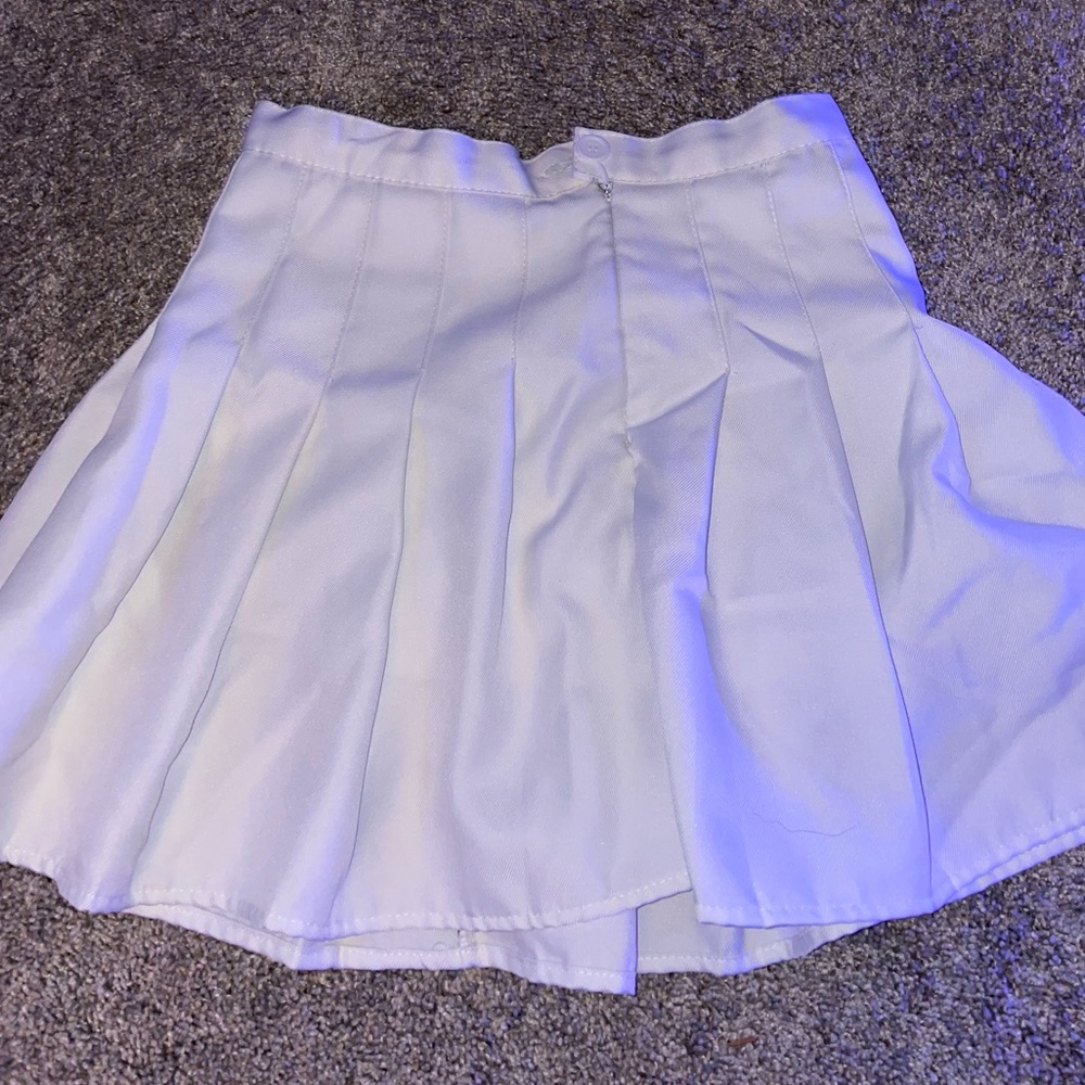 White pleated skirt